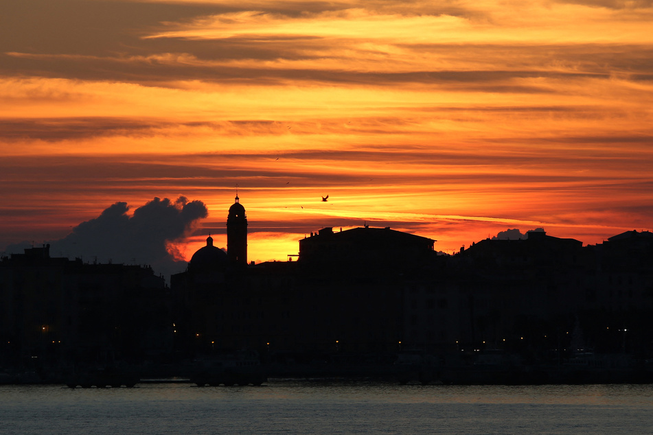 Sunset over the Cathedrale of Notre-Dame-de-l'Assomption during the winter solstice, in Ajaccio, France, on December 21, 2020.