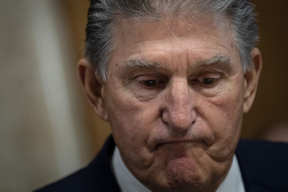 West Virginia Sen. Joe Manchin arrives for a Senate Committee on Energy and Natural Resources hearing on Capitol Hill.