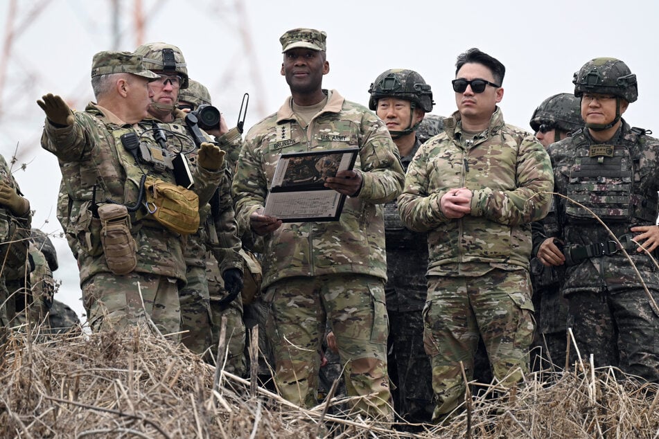 General Xavier T. Brunson (c.), commander of the US Forces Korea, United Nations Command and Combined Forces Command, visits to watch a combined maneuver training with wet gap crossing during the 2026 South Korea-US Freedom Shield military exercise in Yeoncheon on March 14, 2026.