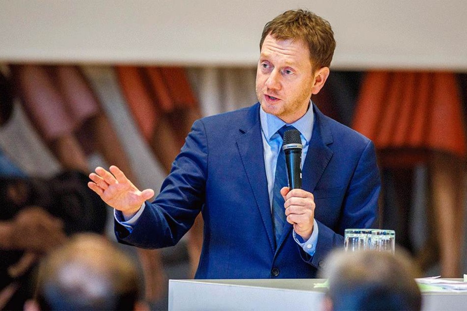 Auch Sachsens Landesvater Michael Kretschmer (42) warb für Verständnis um den Vertrag.