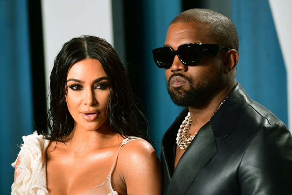 Kanye West calls himself "Baby Putin" and pees on his Grammy Award
