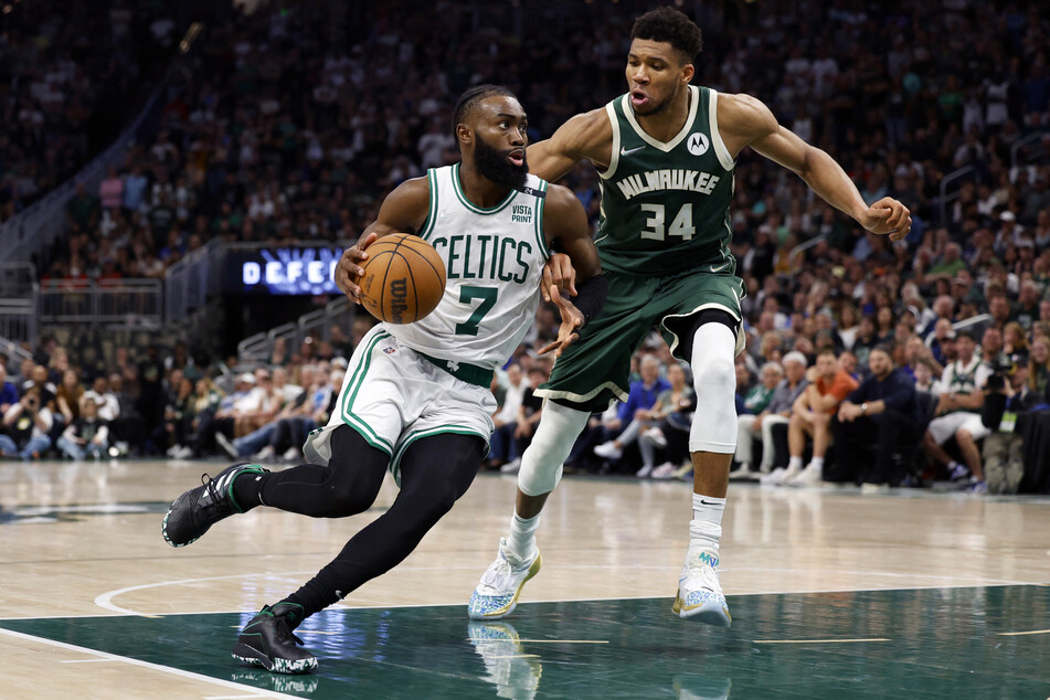 Boston Celtics guard Jaylen Brown (l.) battled against dominating Milwaukee Bucks forward Giannis Antetokounmpo r(.) during game six of the second round of the 2022 NBA playoffs on Friday.