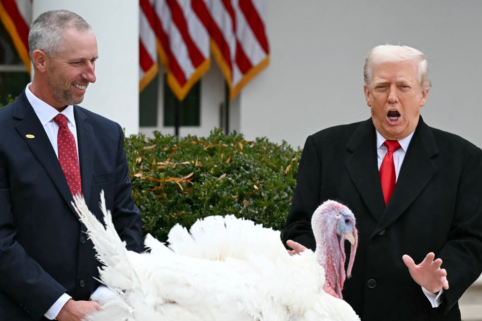 Trump turns turkey pardoning into political roast with jabs at Biden and "fat slob" Pritzker