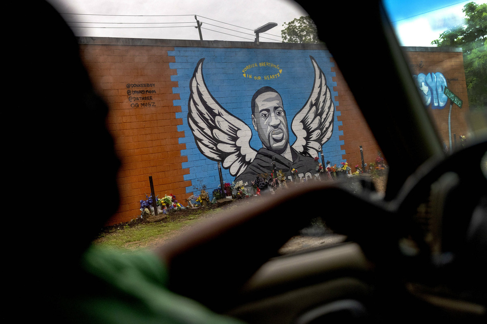 A mural honors the late George Floyd in Houston's Third Ward.