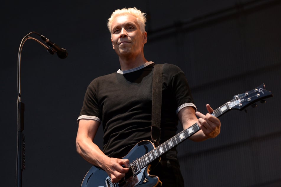 Farin Urlaub (60), Sänger und Gitarrist der Berliner Punkrock-Band Die Ärzte, bei einem Auftritt auf dem Tempelhofer Feld im Jahr 2013. (Archivbild)