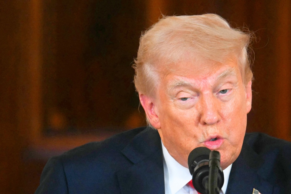 Trump defends possibly sending US into recession with his economic agenda