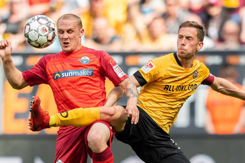 Zuverlässiger Abräumer: Jannik Müller (r.) fährt Paderborns Sven Michel in die Parade.