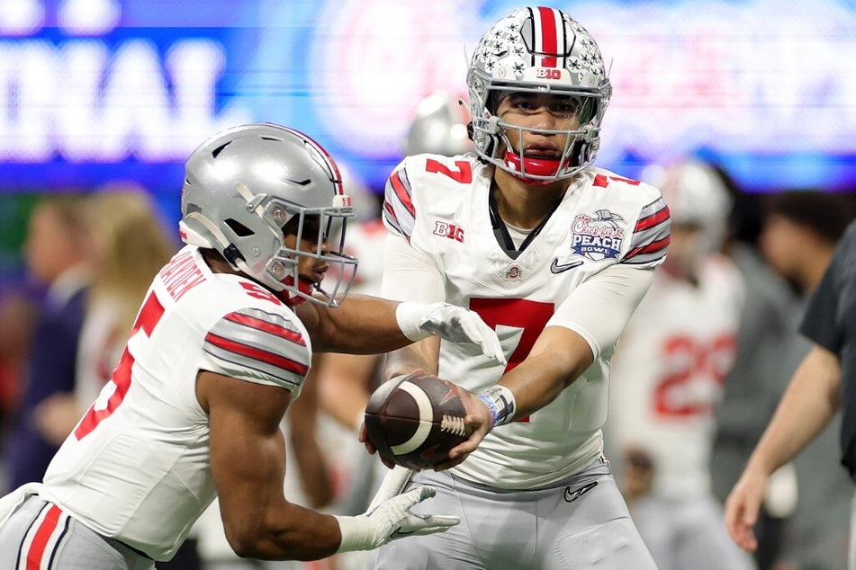 Ohio State Buckeyes' Dallan Hayden (l) is an up-and-coming star running back, who became one of the team's clutch performers last season.
