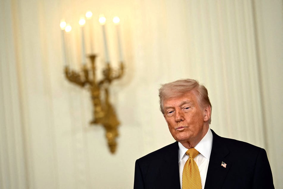 President Donald Trump is pictured in the East Room of the White House in Washington DC on May 6, 2026.