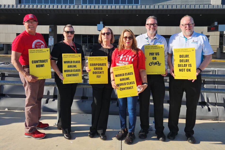 United flight attendants demonstrate in Las Vegas, Nevada, for better wages and working conditions.