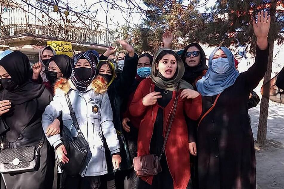 Afghan women in Kabul chant slogans to protest against the ban on university education for women.