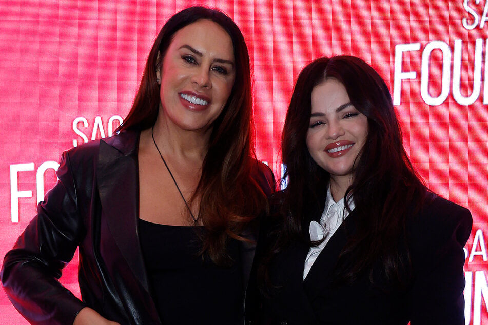 Karla Sofía Gascón (l.) has spoken out after being accused of dissing her Emilia Pérez co-star Selena Gomez (r.) in a social media post.