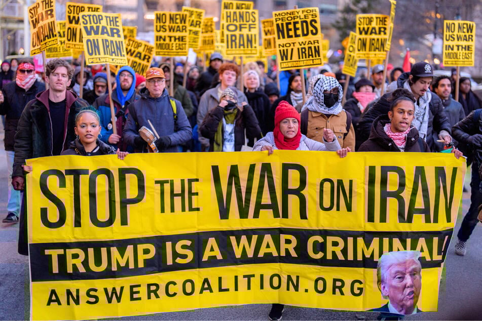 People march during a protest against the war in Iran on March 2, 2026 in New York, New York.