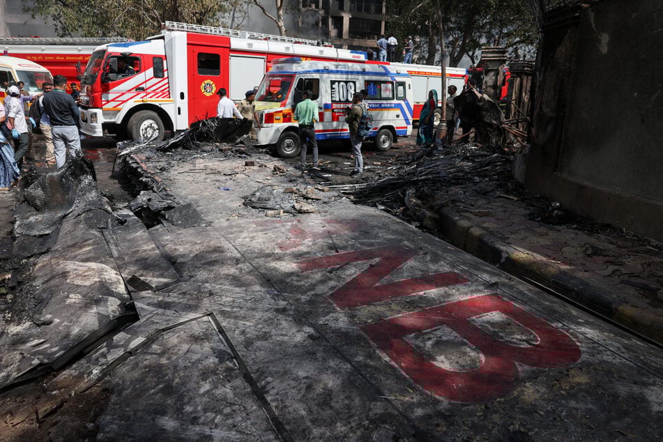 Rescue teams respond to the scene of a Boeing 787 Dreamliner crash in Ahmedabad, India.