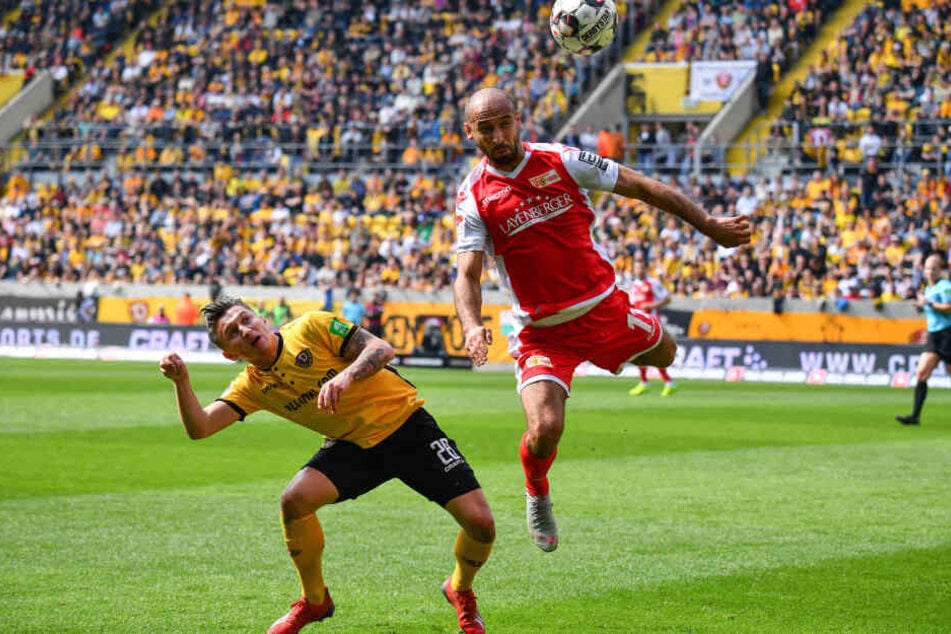 Baris Atik (links) im Zweikampf mit Ex-Dynamo Akaki Gogia.