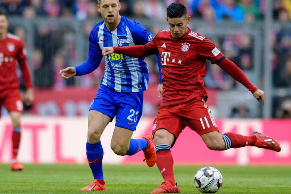 James Rodríguez (r.) und der FC Bayern München taten sich gegen Berlin schwer.
