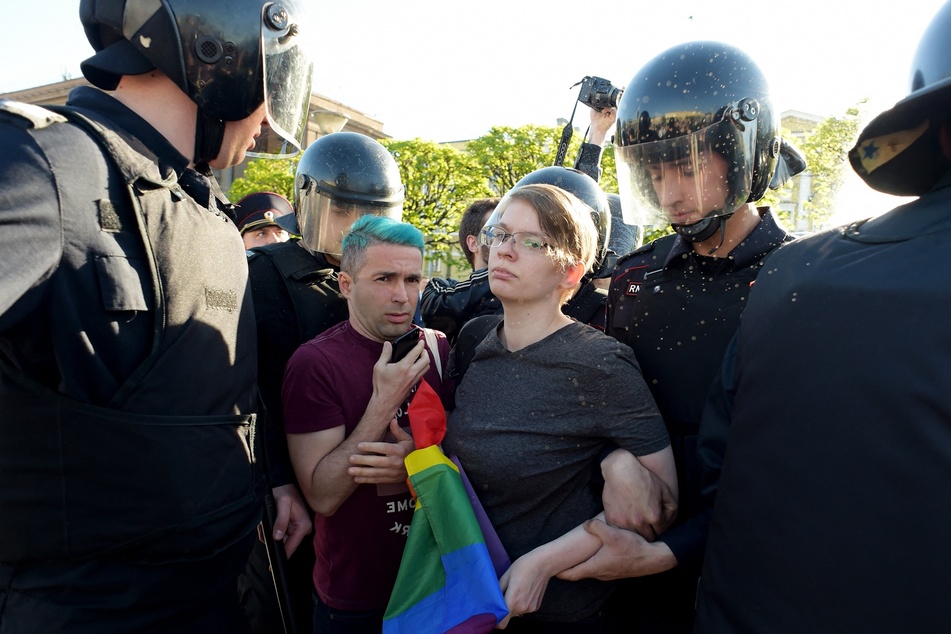 Russian riot police detained gay rights activists during World Day Against Homophobia and Transphobia in Saint Petersburg on May 17, 2019. Police in Moscow recently targeted multiple gay-friendly nightclubs and a men's sauna in what appeared to be simultaneous raids, local media outlets said Saturday.