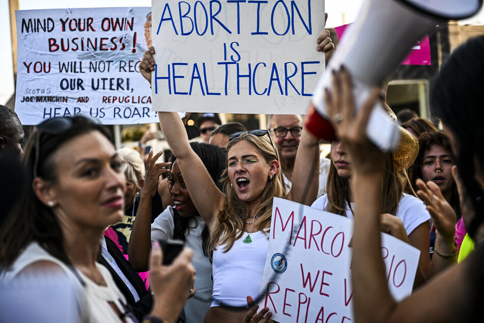 Pro-abortion rights activists rally after the US Supreme Court struck down the right to abortion in Miami, Florida, on June 24, 2022.