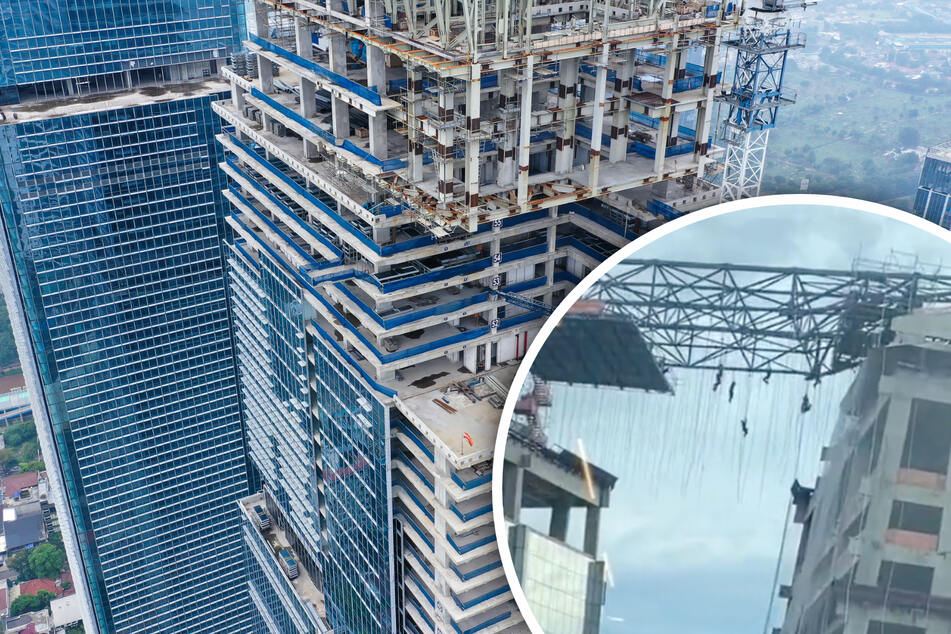 Gerüst kracht in 140 Metern Höhe zusammen: Bauarbeiter klammern sich an Seilen fest