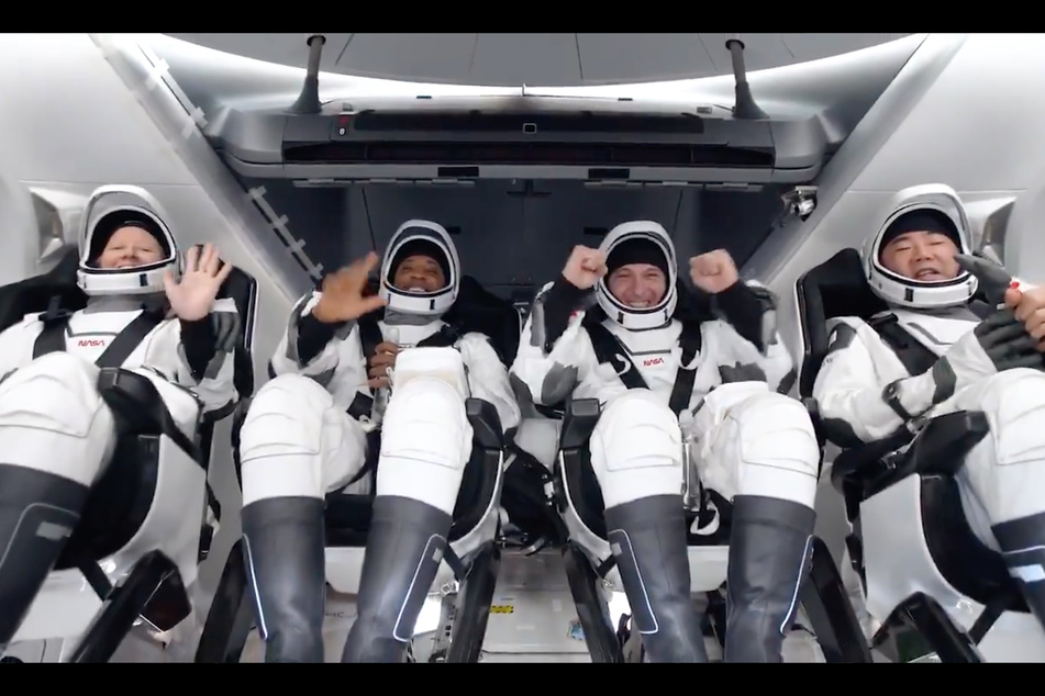 From l. to r.: Astronauts Shannon Walker, Victor Glover, Mike Hopkins, and Soichi Noguchi arrived safely back to Earth.