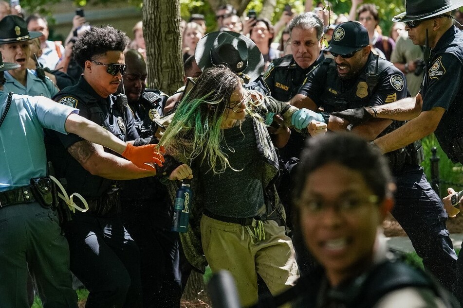 Police officers arrest a demonstrator during a pro-Palestinian protest at Emory University in Atlanta, Georgia.