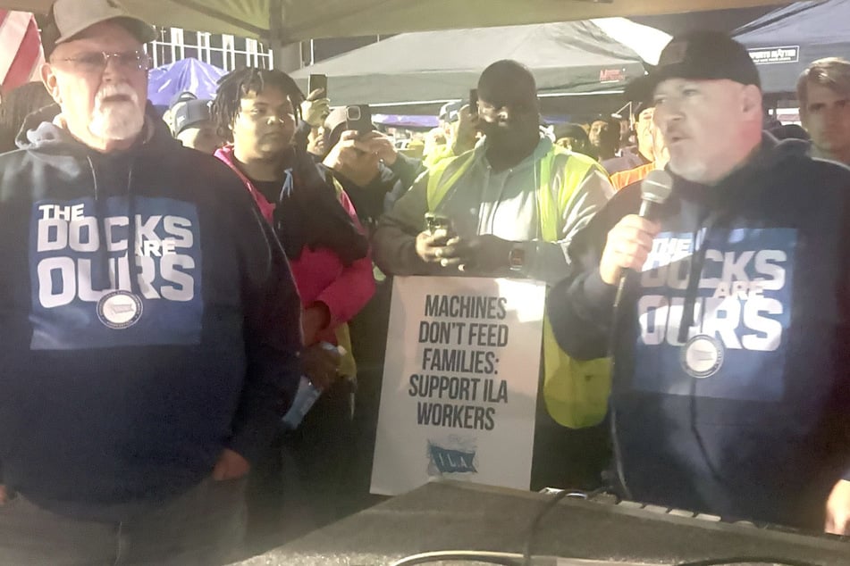 International Longshoremen's Association President Harold Daggett (l.) led dockworkers in a walkout as a long-awaited strike kicked off Tuesday morning.