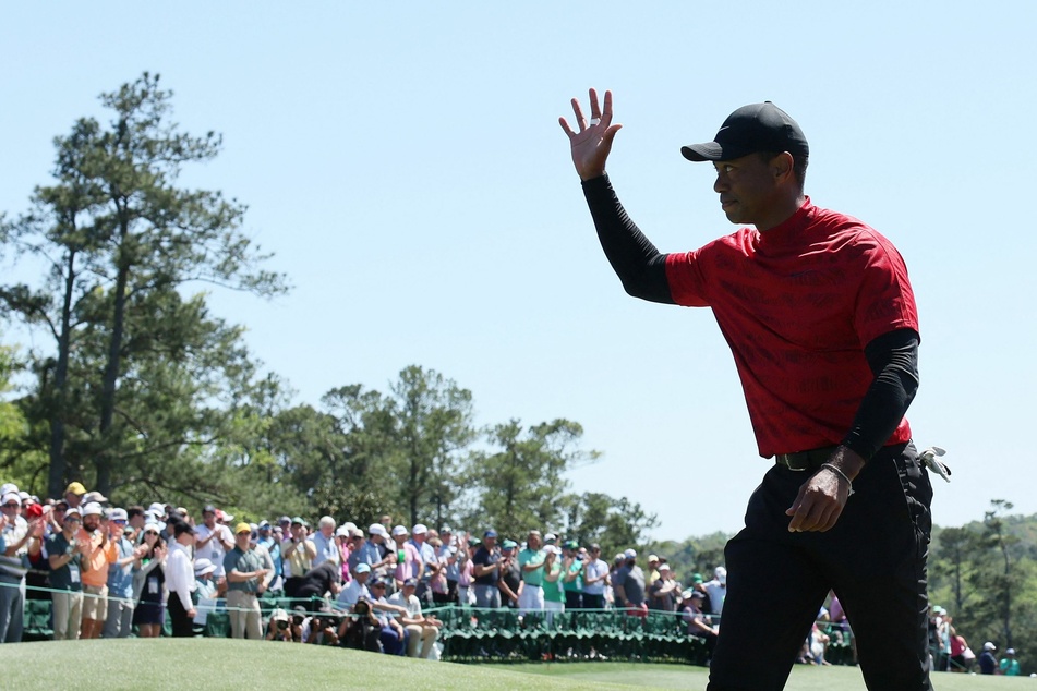 Tiger Woods completes comeback as Scheffler earns historic Masters win