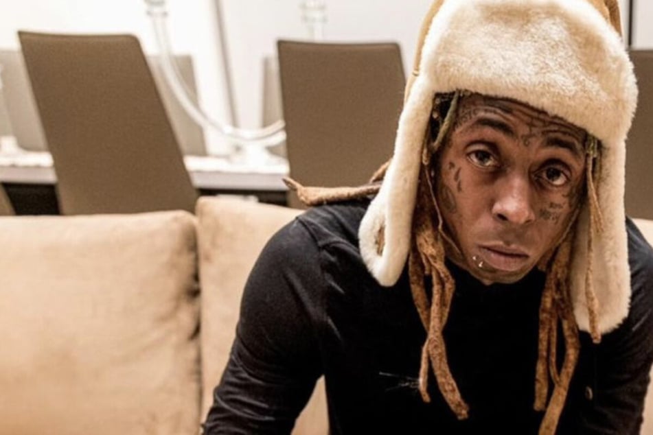 Lil Wayne investigated for allegedly pulling a gun on his own bodyguard!