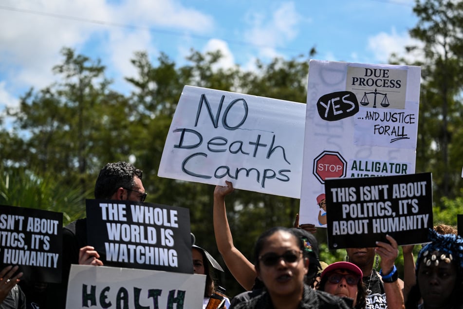 Protesters gather to demand the closure of Alligator Alcatraz in Ochopee, Florida, on July 22, 2025.