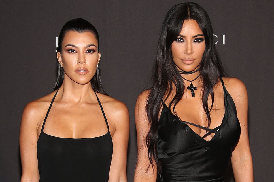 Kim Kardashian (r.) has denied ever hooking up with her sister Kourtney's now-husband.