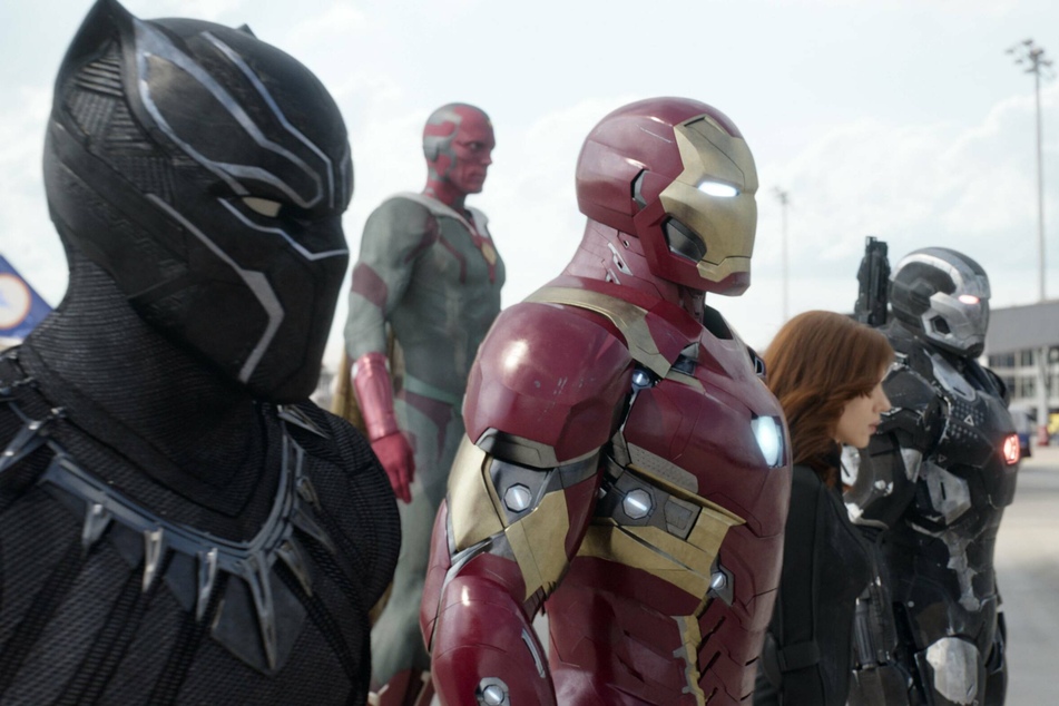 (From l. to r.) Chadwick Boseman, Robert Downey Jr. Paul Bettany, Scarlett Johansson, and Don Cheadle as T'Challa/Black Panther, Tony/Iron Man, Vision, Natasha Romanoff/Black Widow, and James Rhodes/War Machine in Captain America: Civil War.