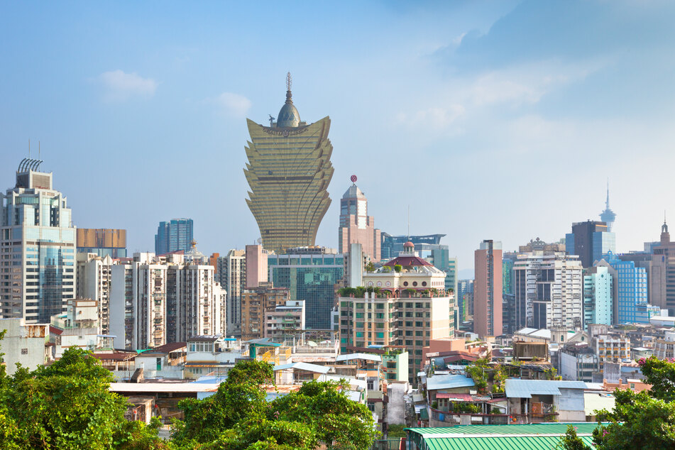 An aerial view shows the skyline and the Grand Lisboa casino in Macau, China.