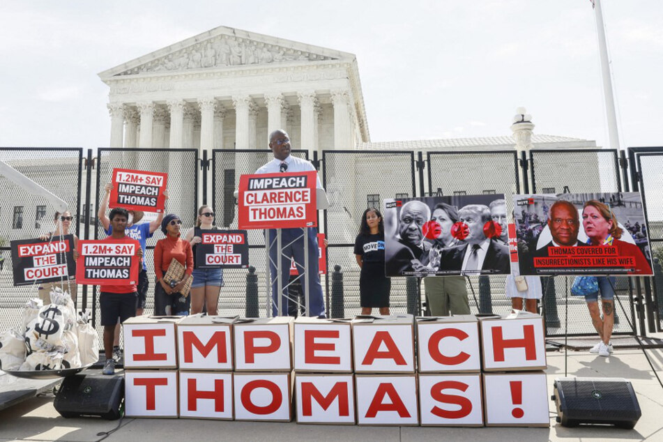 Rep. Jamaal Bowman speaks at a rally calling for the impeachment of Supreme Court Justice Clarence Thomas.