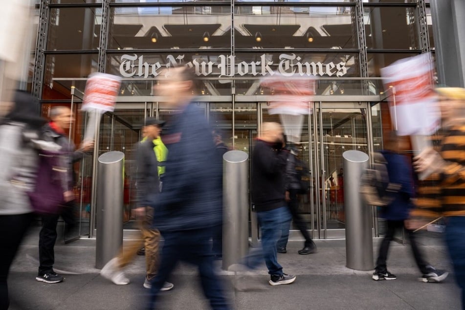 Members of The New York Times Tech Guild protest outside of the New York Times headquarters building on November 4, 2024 – one day before Election Day.