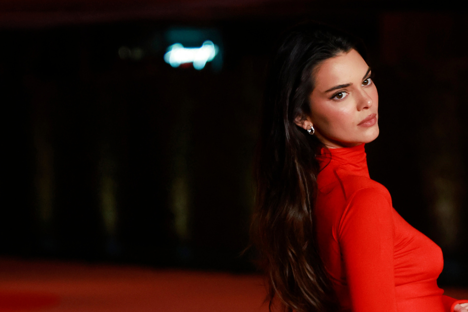 Kendall Jenner is a vision in red while filming in Paris