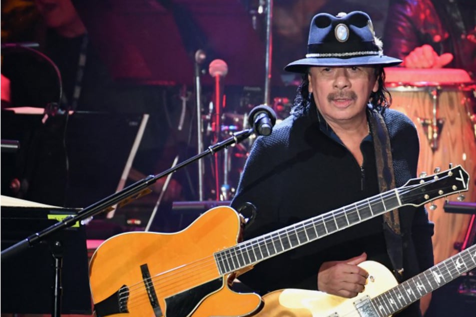 Santana is "doing well" after onstage collapse in Michigan
