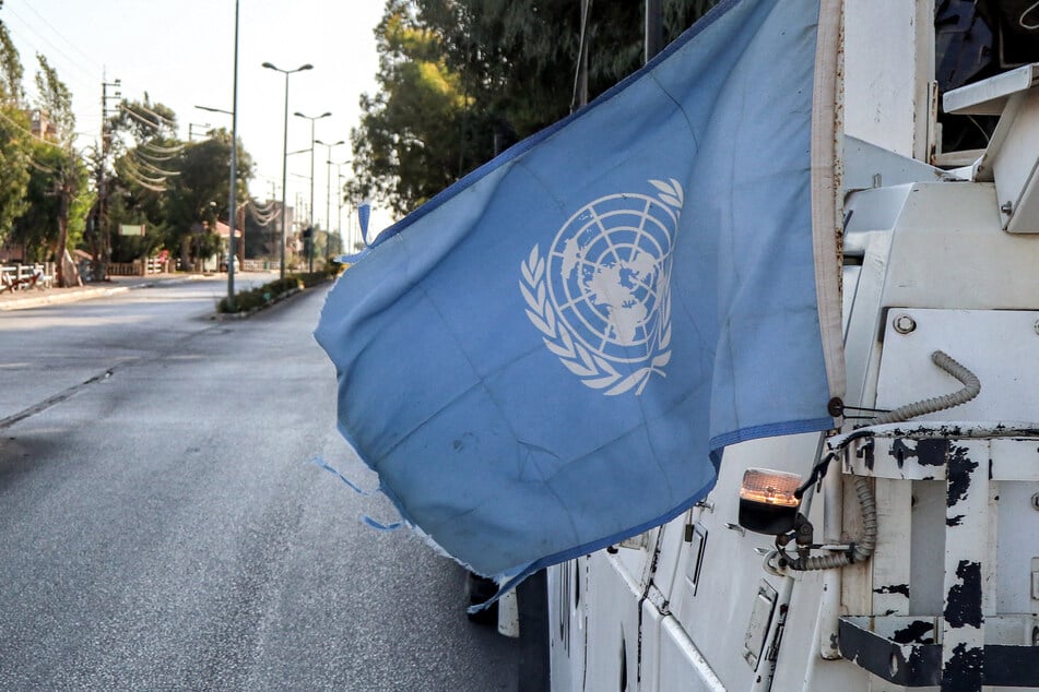 The Israeli military said its forces fired at a threat near a UN peacekeeping mission position on Friday in southern Lebanon and acknowledged that a "hit" was responsible for wounding two people after an initial examination of the incident.