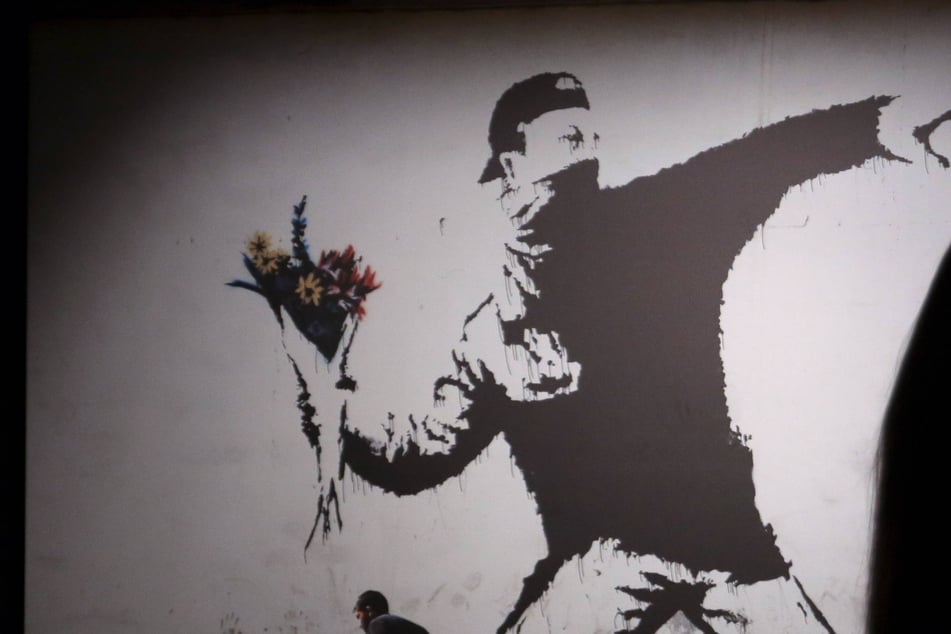 Enigmatic street artist Banksy may have revealed his true identity over two decades ago.