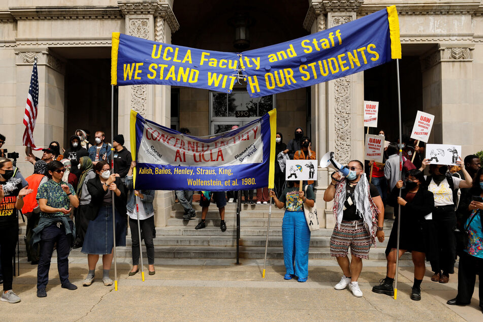 UCLA faculty and staff rally in support of students facing arrest and disciplinary measures for their participation in Gaza solidarity protests.