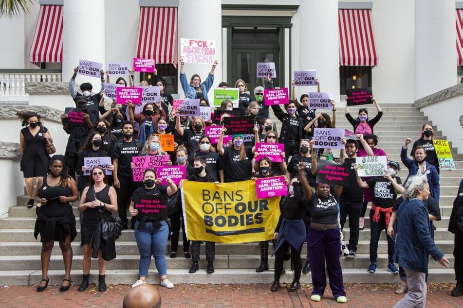 Advocates for bodily autonomy march to the Florida Capitol to protest a bill before the state legislature to limit abortions, on February 16, 2022, in Tallahassee.