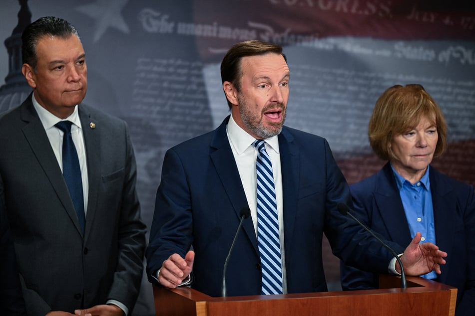 Senator Chris Murphy (c.) of Connecticut introduced the No Political Enemies Act on Thursday, promising to protect free speech amid the Trump administration's crackdown on dissent.