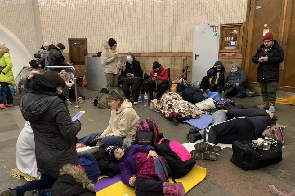 People take shelter in a subway station in Kyiv.