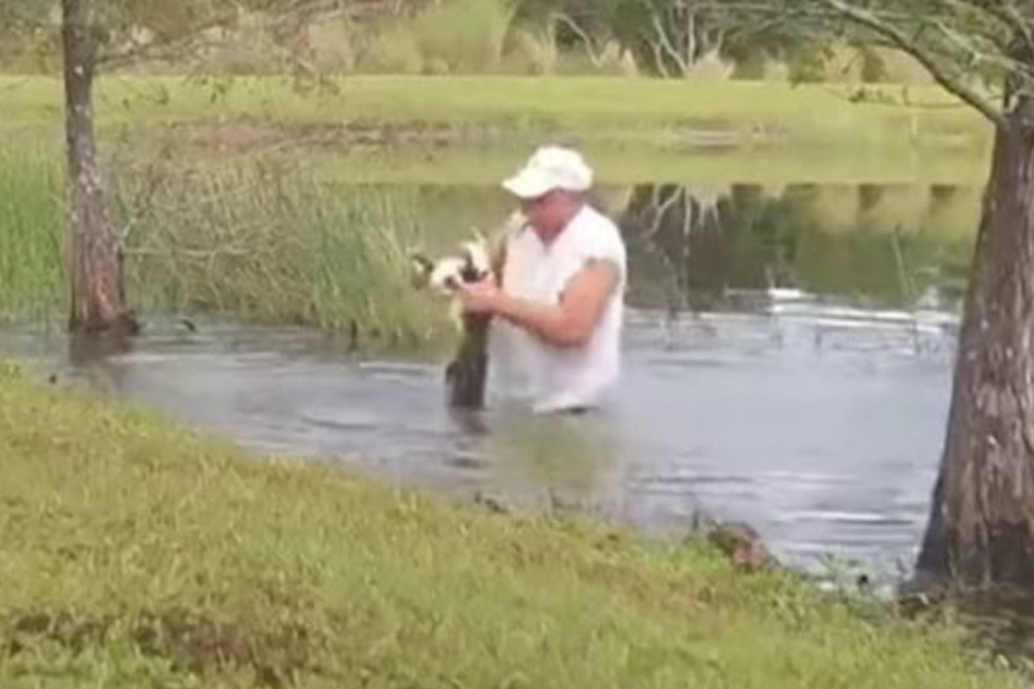 The man probably risked his life for that little dog.