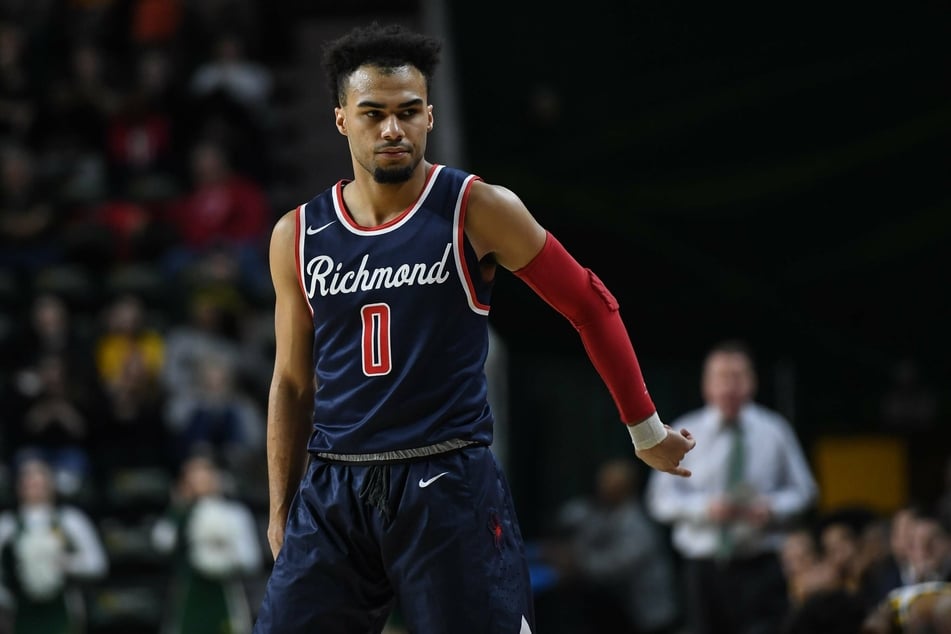 Jacob Gilyard led all scorers with 24 points as Richmond defeated Iowa in the first round.