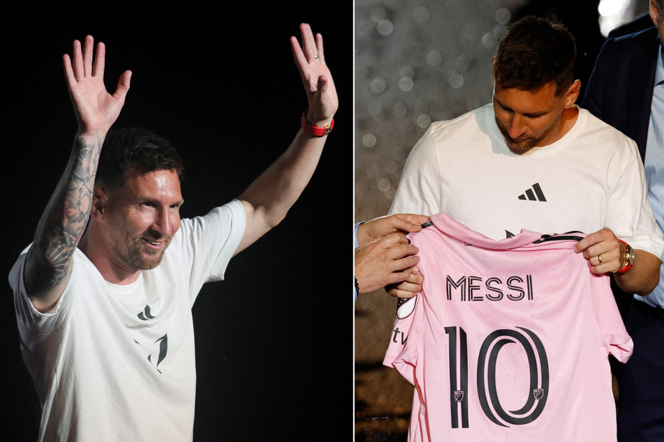 Soccer legend Lionel Messi receives his new Inter Miami CF jersey during the unveiling ceremony.