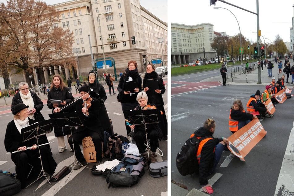 Wieder klebten sich Klimaaktivisten auf die Straßen von Berlin und blockierten den Verkehr rund um das Frankfurter Tor. Auch ein Orchester platzierte sich mitten auf der Straße.