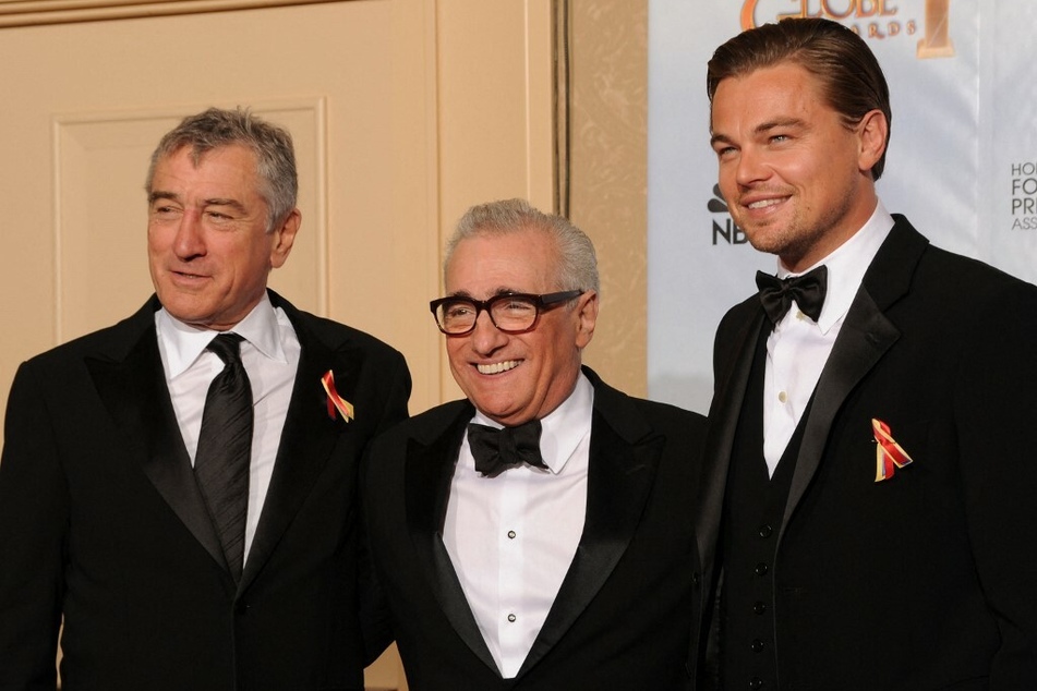 Director Martin Scorsese (c.) with actors Robert De Niro (l.) and Leonardo DiCaprio (r.) in 2010.