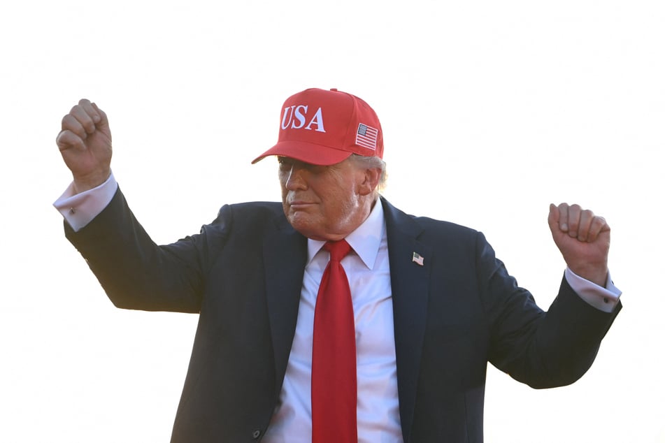 President Donald Trump dances as he leaves the stage after speaking at the Salute to America Celebration at the Iowa State Fairgrounds in Des Moines on Thursday.