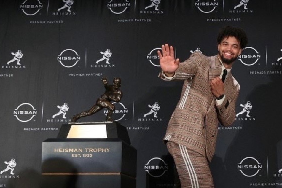 USC quarterback Caleb Williams became the eighth Trojan player and third quarterback in program history to win the college football Heisman Trophy on Saturday.