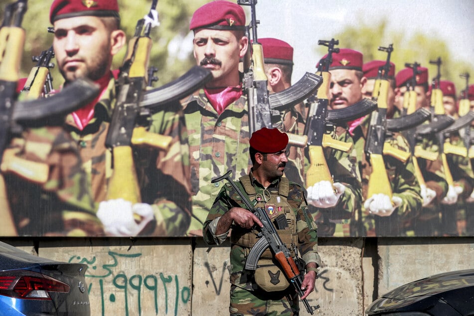 Iraqi paramilitary group warns US of "immense losses" as it prepares for long war in Iran